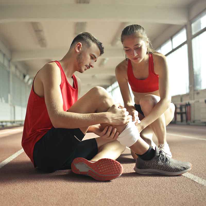 sports injury rehab treatment in action image of