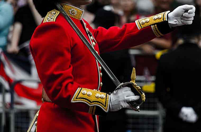 queens guards marching through belgravia image of